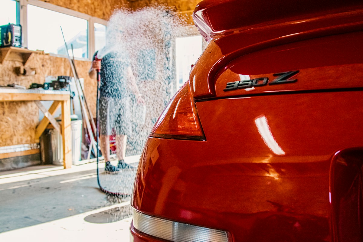 A freshly washed red car